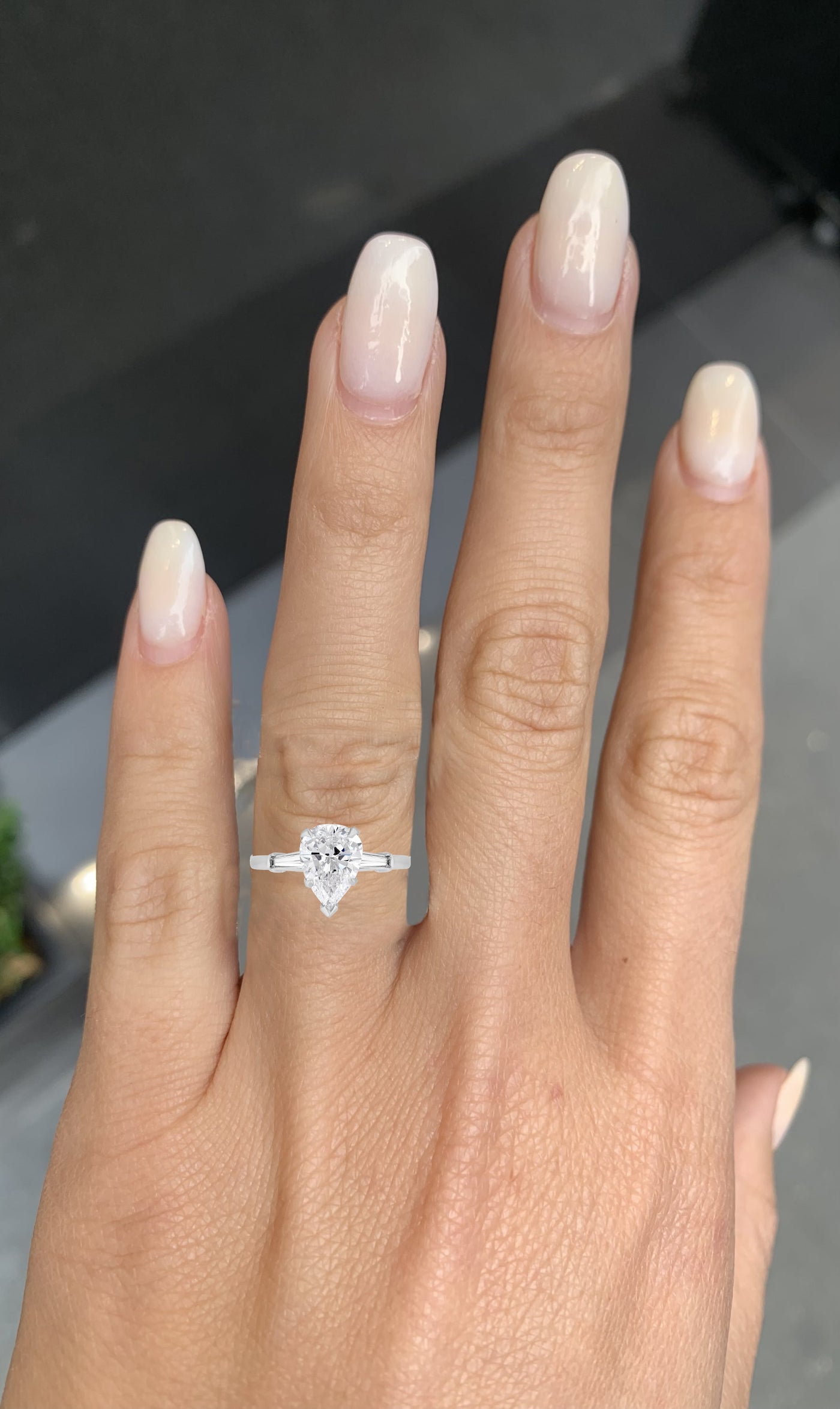 Pear Shaped Diamond with Tapered Baguette Engagement Ring