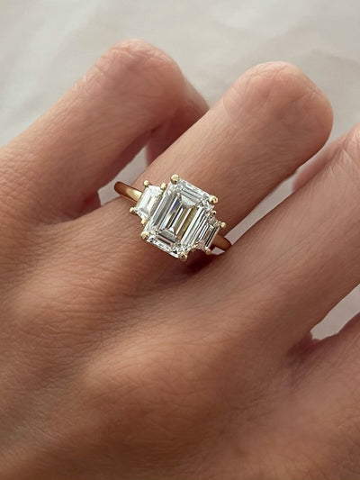 Emerald-Cut Diamond with Trapezoid Side Stone Ring